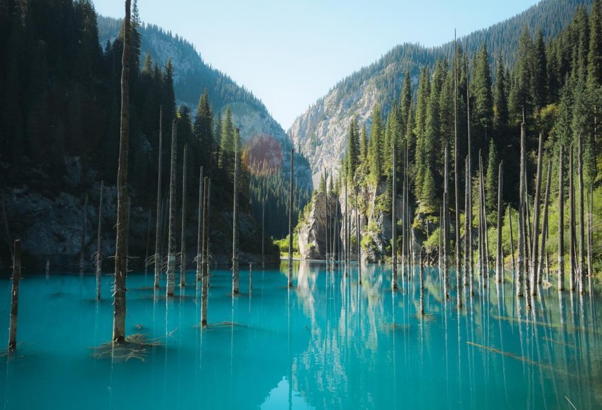 Lake Kaiyndy showcases nature’s beauty in perfect stillness. Photo credit: Kazakh Tourism