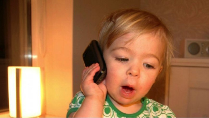 A child dials 911 seeking assistance from police officer